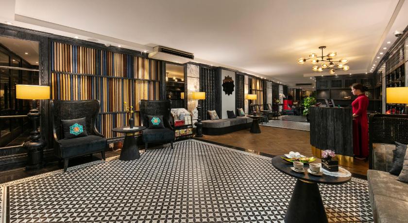 a living room filled with furniture and a tv, Shining Central Hotel and Spa in Hanoi