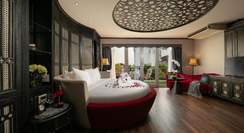 a large room with a large bed and a large window, Shining Central Hotel and Spa in Hanoi