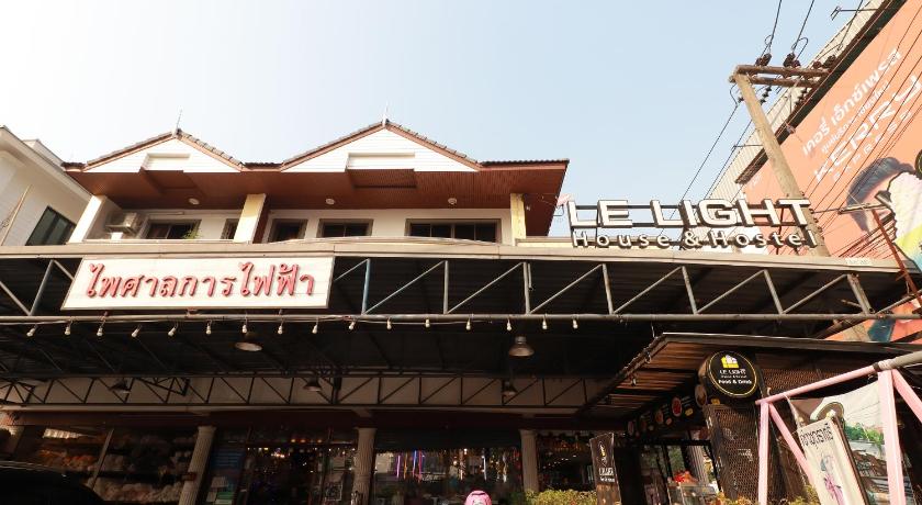 a building with a sign on the side of it, OYO 531 Le Light House & Hostel in Chiang Mai