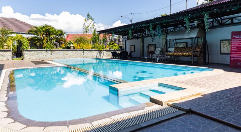 RedDoorz Premium @ Sea Residence Manado photo