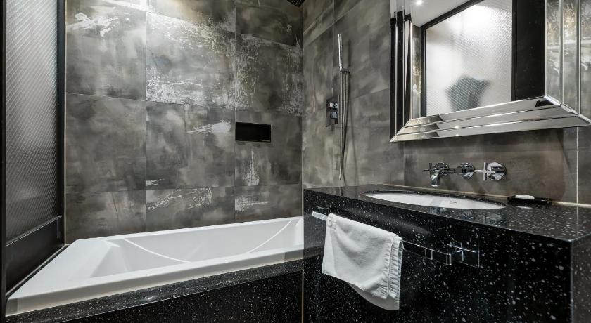 Фото: Семейный номер Делюкс с 2 отдельными кроватями (Deluxe Family Twin Room) 11