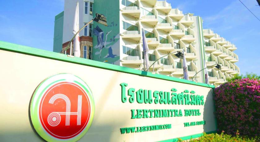 a sign on the side of a building, Lertnimitra Hotel in Chaiyaphum
