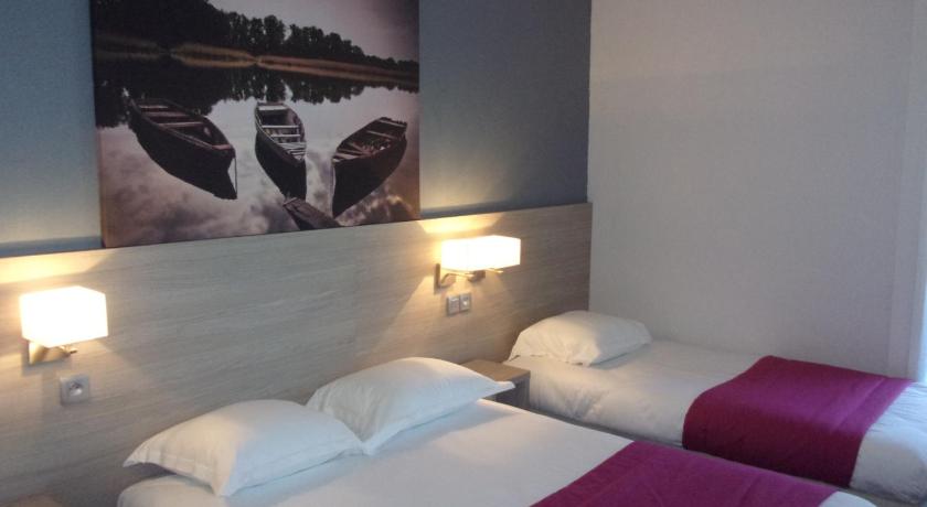 Image of Triple Room (1 Double Bed + 1 Single Bed) 4