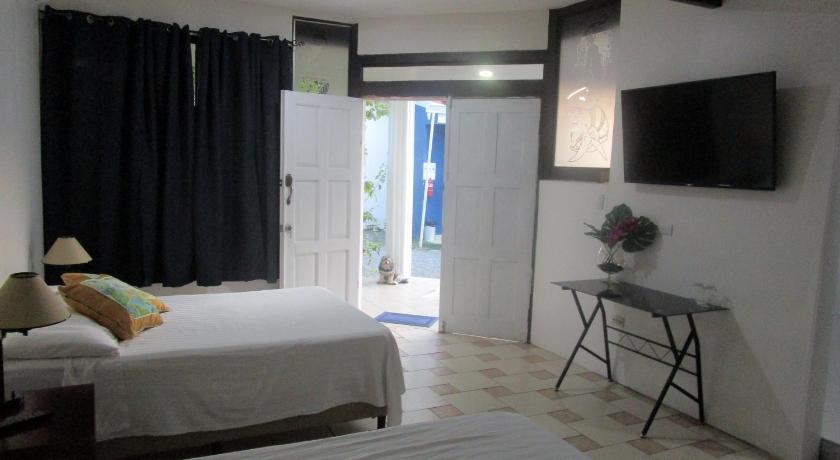 Image of Standard Double Room with Two Double Beds 7