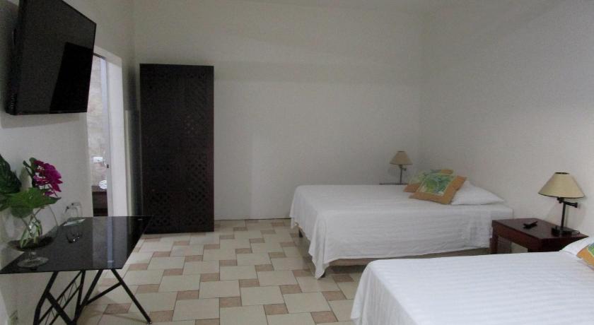 Image of Standard Double Room with Two Double Beds 8