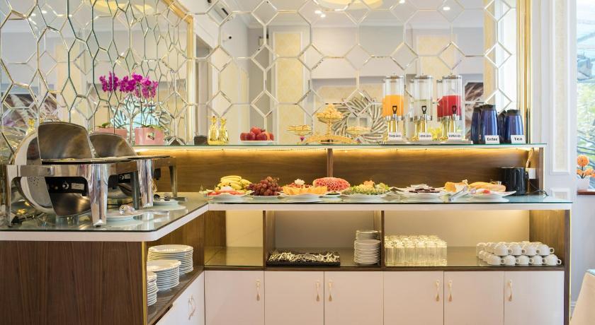 a kitchen filled with lots of different types of fruit, Hanoi Lotus Boutique Hotel in Hanoi