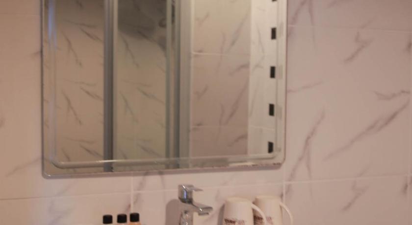 รูปของห้องพักสำหรับสามท่านพร้อมวิวเมือง (Triple Room with City View) 2