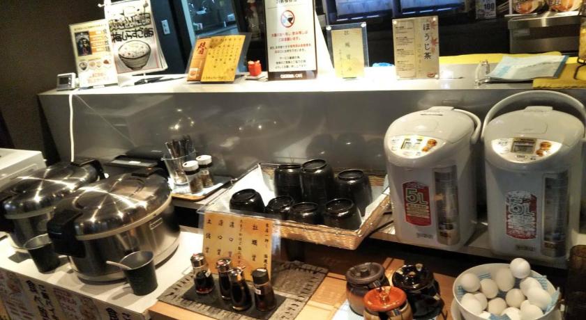 a kitchen counter filled with pots and pans, Gran Customa Hotel in Yokohama