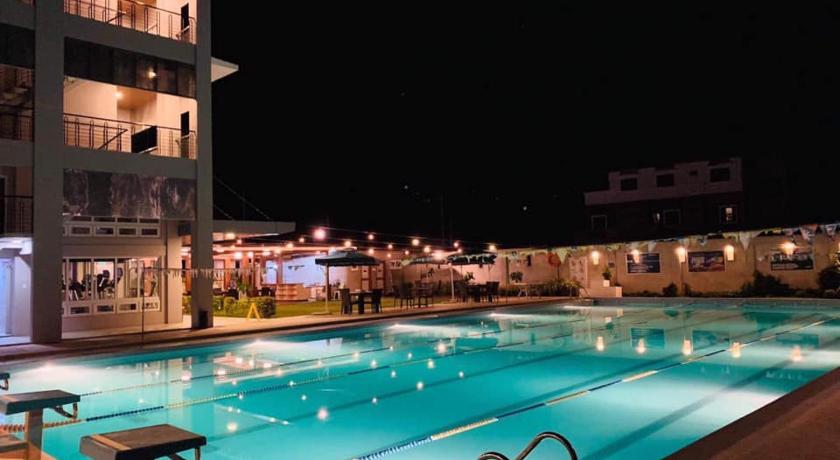 a large swimming pool in a hotel room, Ciabel Hotel and Fitness Center in La Union