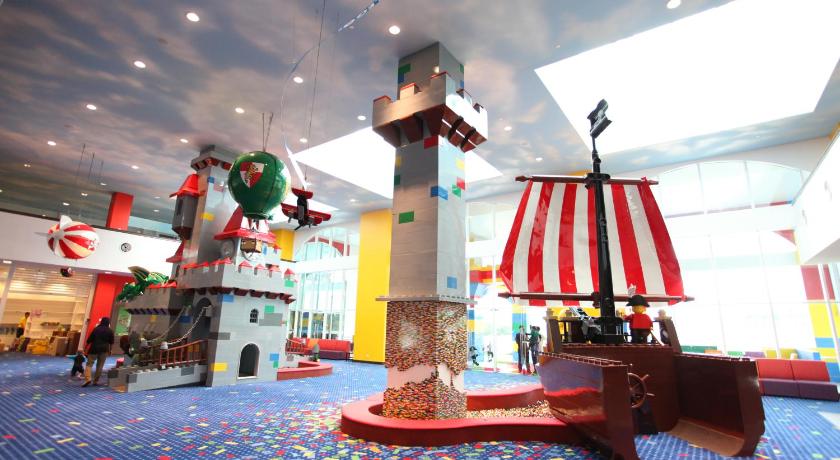 a large christmas tree in the middle of a room, The Legoland Malaysia Resort in Johor Bahru