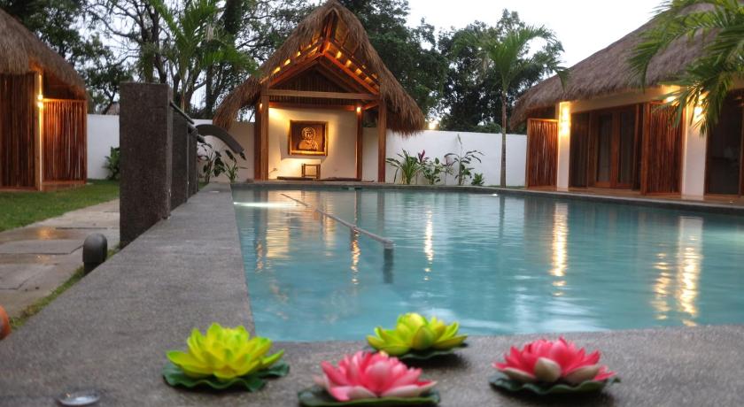 a swimming pool with flowers in it, SAMADHI Resort & Hydrospa Panglao in Bohol
