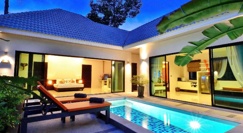 a room with a pool, chairs, and a table in it, Chaweng Noi Pool Villa (SHA Plus+) in Koh Samui