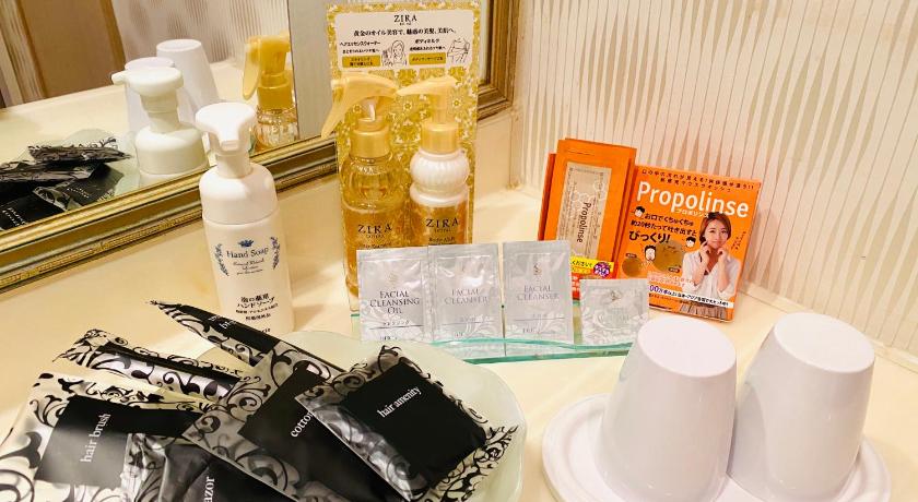 a counter top with a bunch of toothbrushes on top of it, Hotel LUNA (Adult Only) in Tokyo