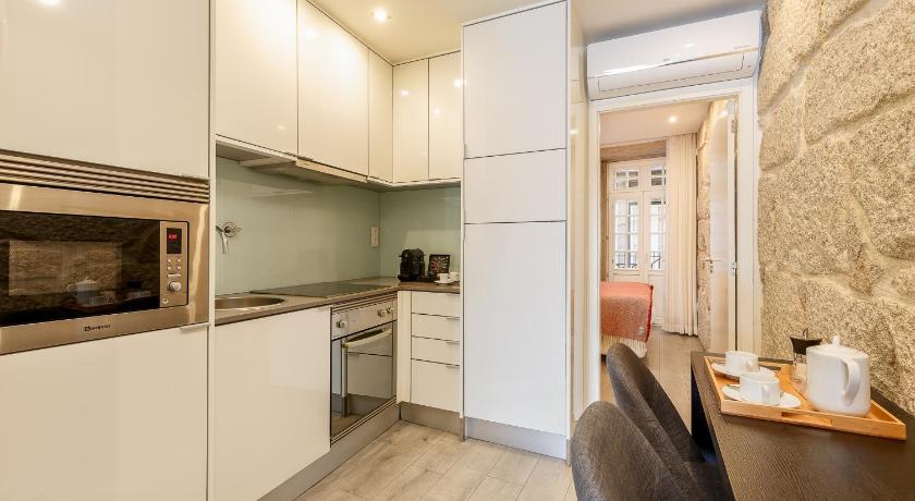 Image of One-Bedroom Apartment with Balcony and River View - First Floor 1