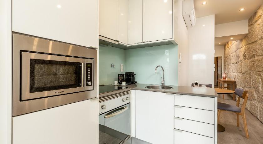 Image of One-Bedroom Apartment with Balcony and River View - Second Floor 1