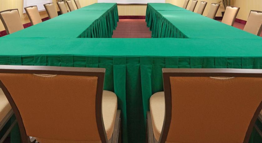 a dining room table with chairs and tables, Holiday Inn Express Tapachula in Tapachula
