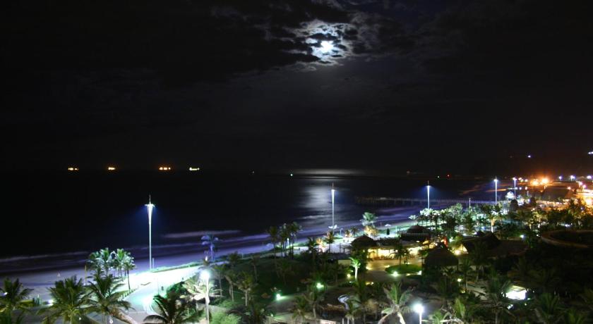 a city at night with a large body of water, Silver Sands 1 Self Catering and Timeshare Lifestyle Resort in Durban