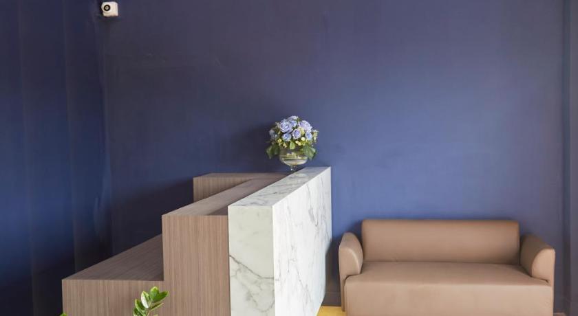 a living room with a green wall and a blue wall, Blue 26 in Nakhon Pathom