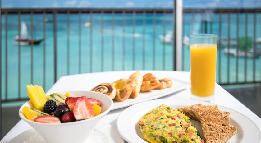a plate of food on a table, Holiday Inn Resort Aruba - Beach Resort & Casino in Noord