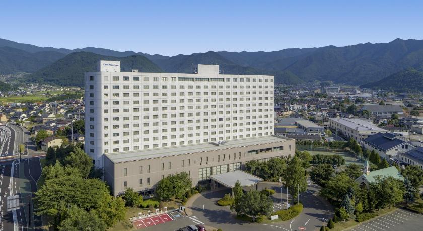 a large building with a large clock on it, Royal Hotel NAGANO in Nagano