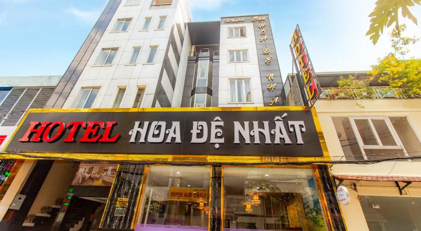 a store front with a sign that reads "downtown", Hoa De Nhat Hotel in Ho Chi Minh City