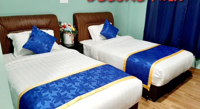 Image of Deluxe 2 Single Bed 3