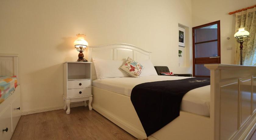 Image of Quadruple Room with Garden View 8