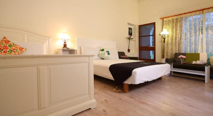 Image of Quadruple Room with Garden View 4