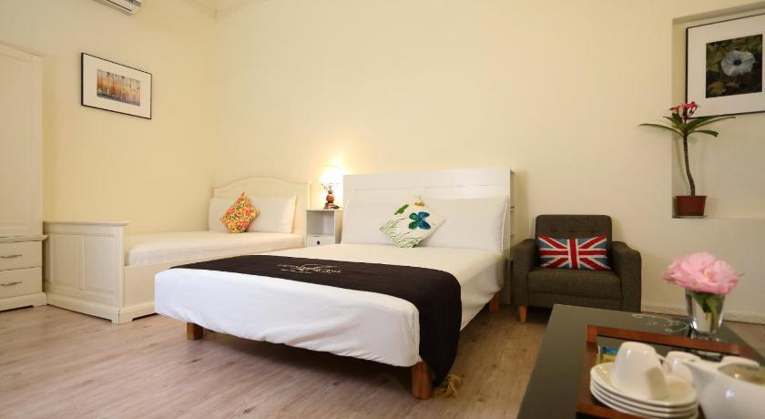 Image of Quadruple Room with Garden View 1