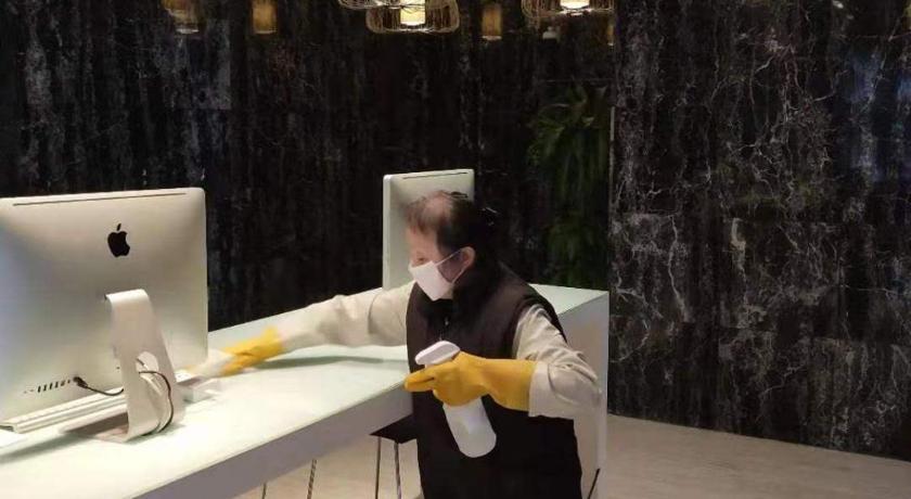 a man standing in front of a sink in a room, Modena by Fraser Putuo Shanghai in Shanghai