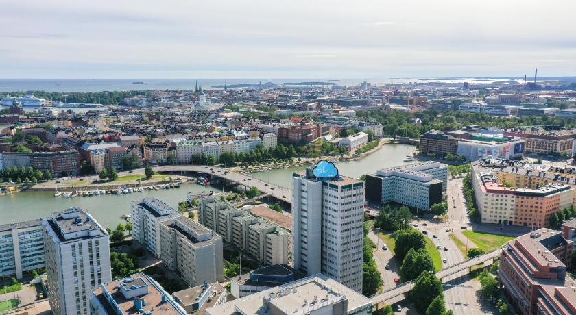 a large city with tall buildings and a clock tower, Sky Hostel Helsinki in Helsinki