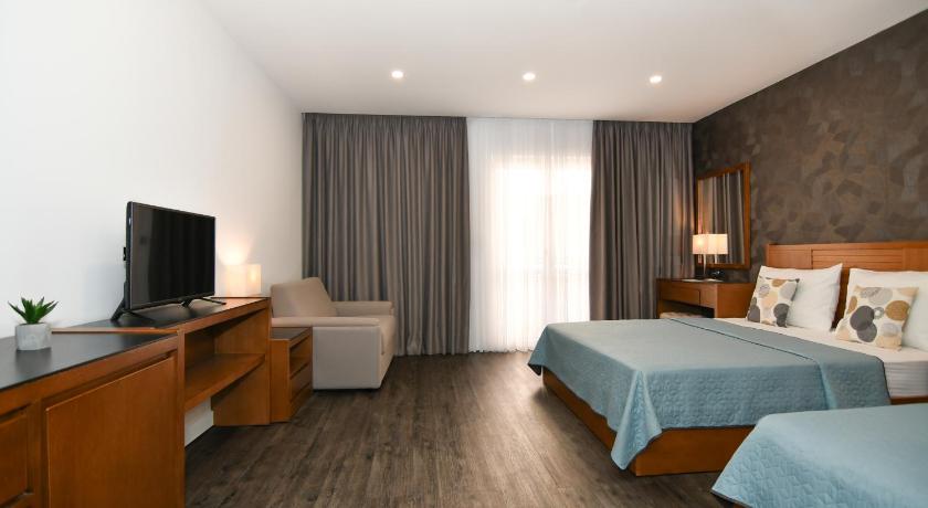 Image of Standard Triple Room Garden View 4