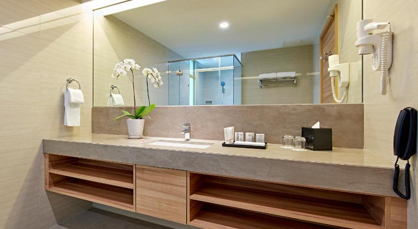 a bathroom with a sink and a mirror, Sunway Lagoon Hotel - formerly Sunway Clio Hotel in Kuala Lumpur