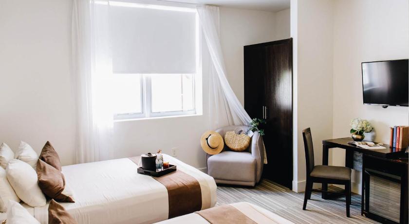 Immagine di Camera con 2 Letti Matrimoniali Queen Size - Accessibile per Disabili (2 Queen Beds Accessible Room) 1