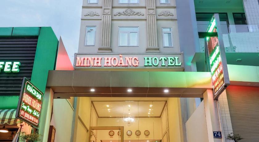 a large building with a clock on the front of it, Minh Hoang Hotel in Ho Chi Minh City