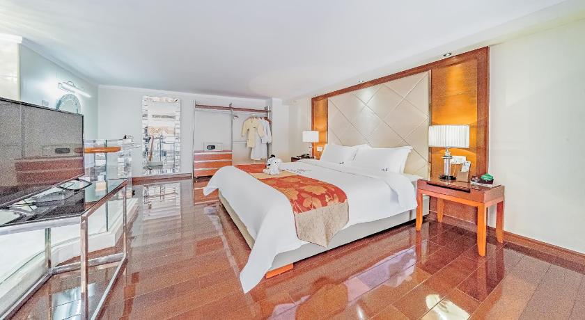 รูปของห้องสวีทดีลักซ์แบบดูเพล็กซ์ เตียงควีนไซส์ (Duplex Deluxe Suite - Queen Bed) 0