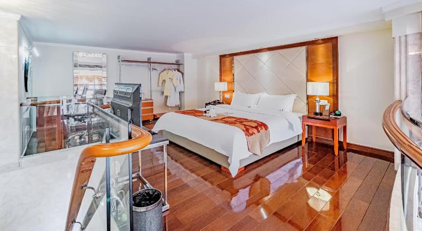 รูปของห้องสวีทดีลักซ์แบบดูเพล็กซ์ เตียงควีนไซส์ (Duplex Deluxe Suite - Queen Bed) 8