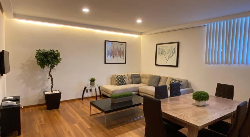 a living room filled with furniture and a table, CASA DONCELES Apt 5, Prime Location, Super confortable and Spacious!! in Mexico City
