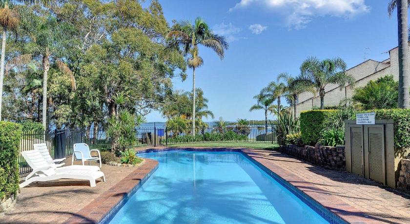 The Moorings 15 stunning with water views and pool photo