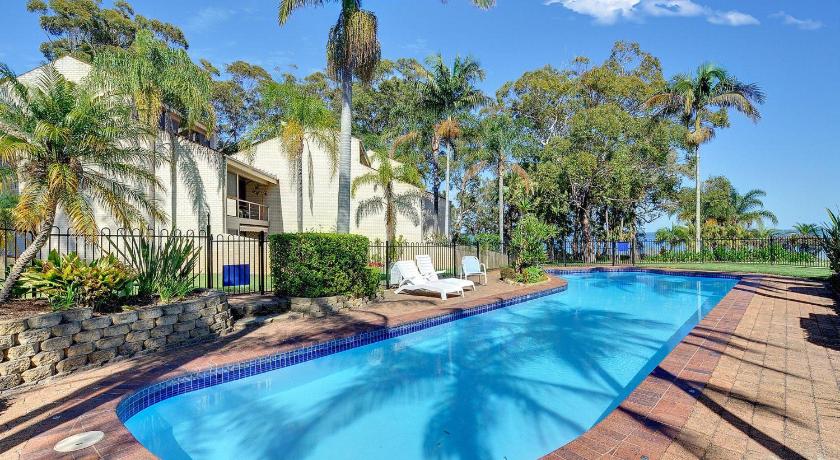 The Moorings 15 stunning with water views and pool photo