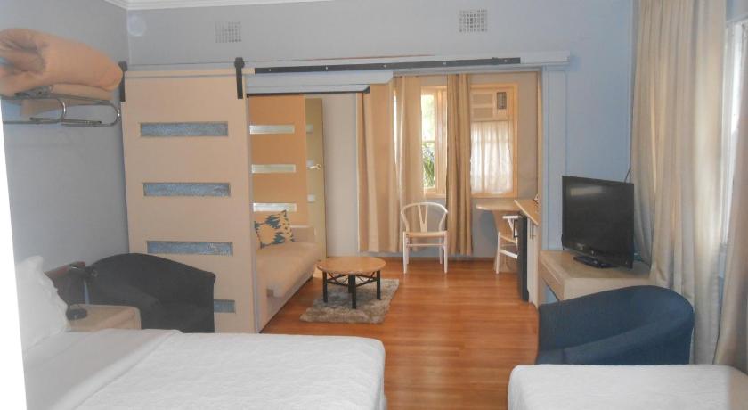 Foto, millel on kujutatud Deluxe Triple Room 0