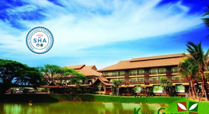 a large building with a clock on the side of it, Kong Garden View Resort (SHA Certified) in Chiang Rai