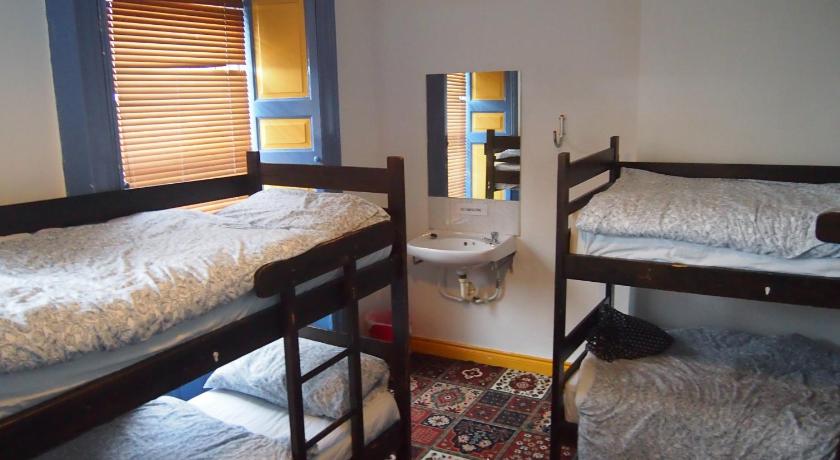 Single Bed in Male Dormitory Room with Shared Bathroom, Cashel Holiday Hostel in Cashel