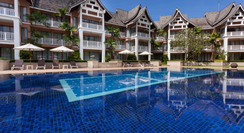 a hotel room with a pool and a swimming pool, Allamanda Laguna Phuket by RESAVA in Phuket