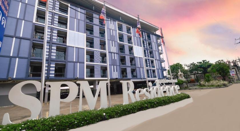 a building with a sign on the side of it, Spm Residence in Chonburi
