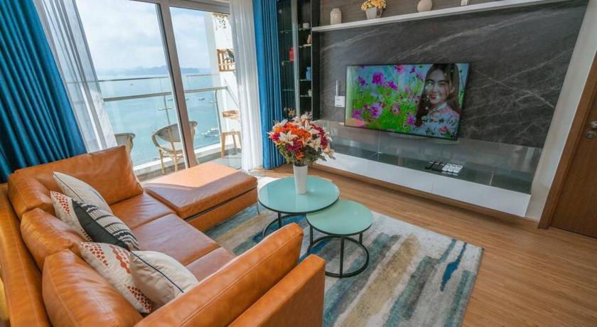 a living room filled with furniture and a tv, BOM HOMES- THE SAPPHIRE HA LONG RESIDENCE APARTMENt in Hạ Long