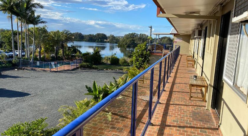 a view from a balcony of a building with a view of the ocean, Taree Motor Inn in Taree