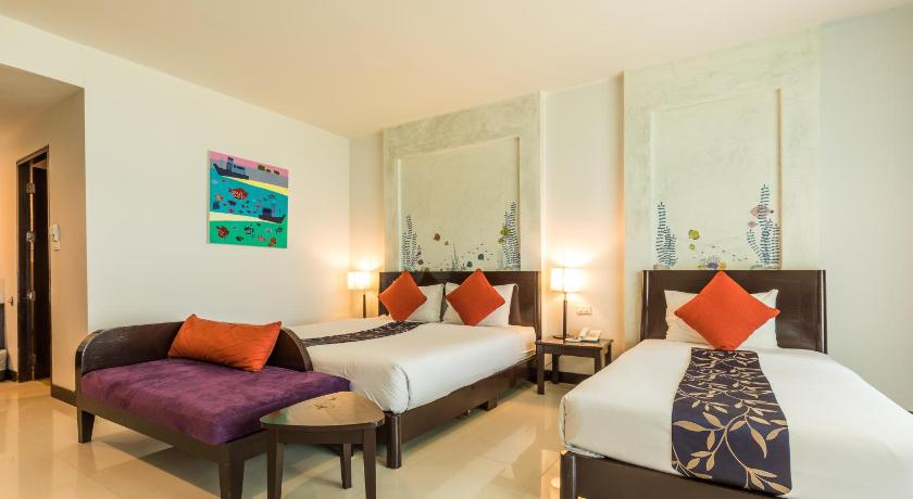 a hotel room with two beds and two lamps, Krabi Aquamarine Resort  (SHA Extra Plus) in Krabi