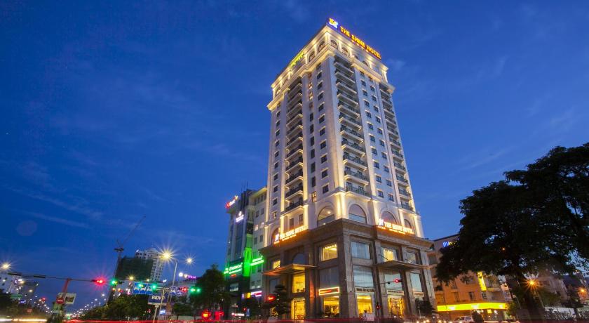 a tall building with a clock on the top of it, THE SHINE HOTEL in Haiphong