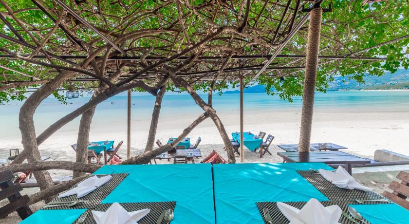 a beach with umbrellas on the sand, Chaweng Garden Beach Resort (SHA Extra Plus) in Koh Samui